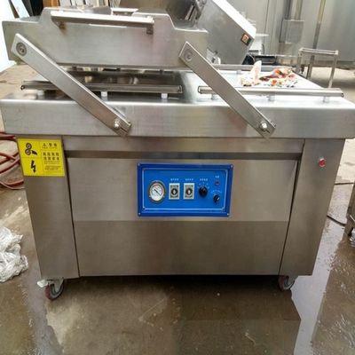 Máquina de embalaje a vacío de doble cámara para mariscos / carne salada / pescado seco / cerdo / carne de res / arroz